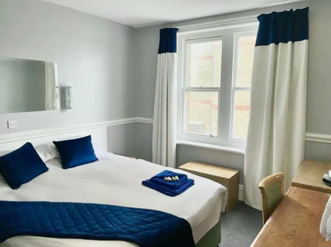 Comfortable double bedroom with natural light