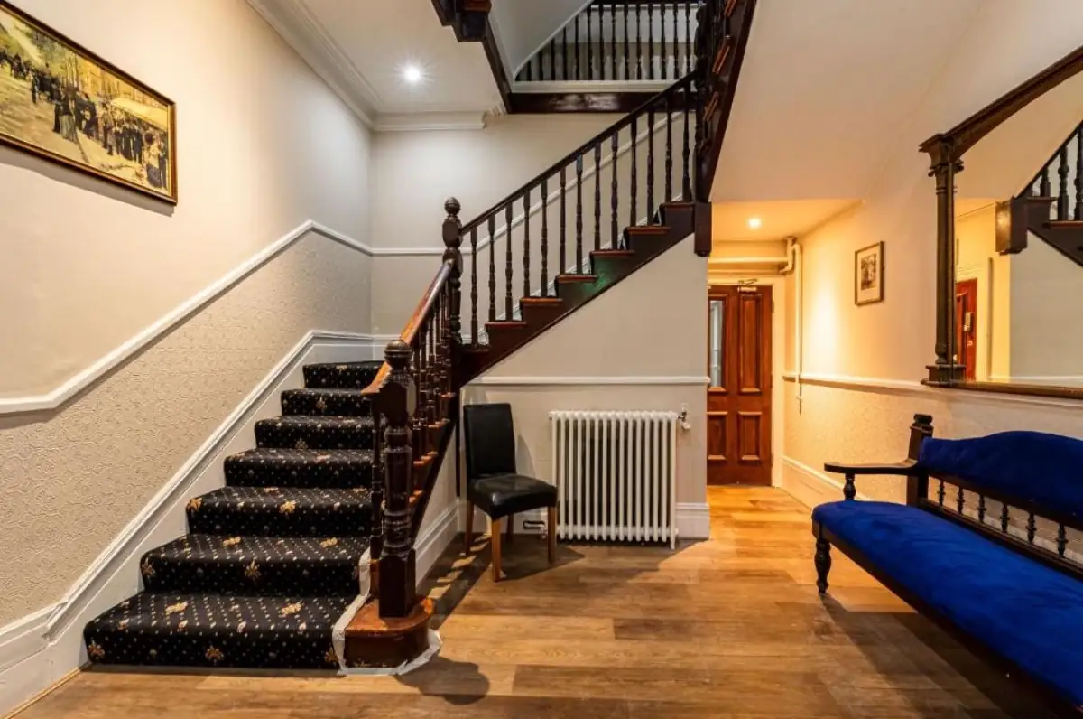 Elegant staircase and entrance hall at Royal Hotel Sheerness